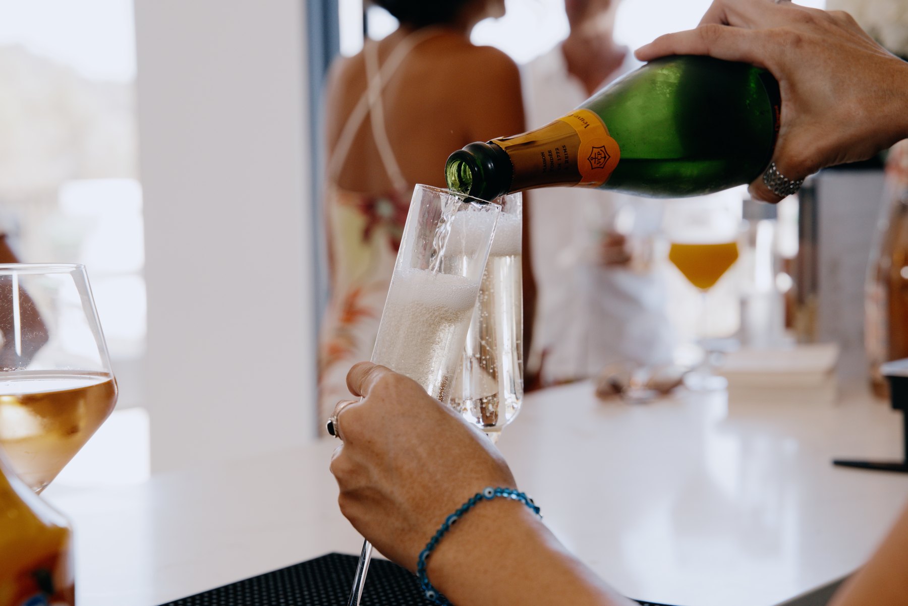 Champagne being poured into a glass